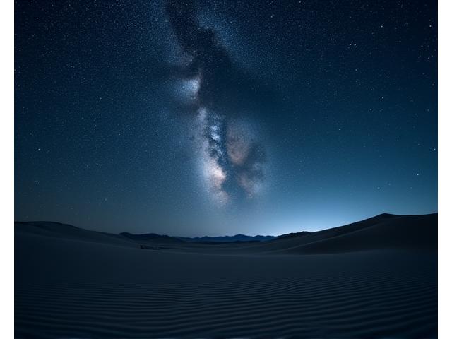 Nuit étoilée spectaculaire au-dessus d'une plage désertique sans fin.